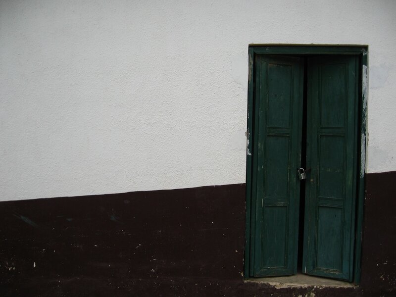 green door on white wall