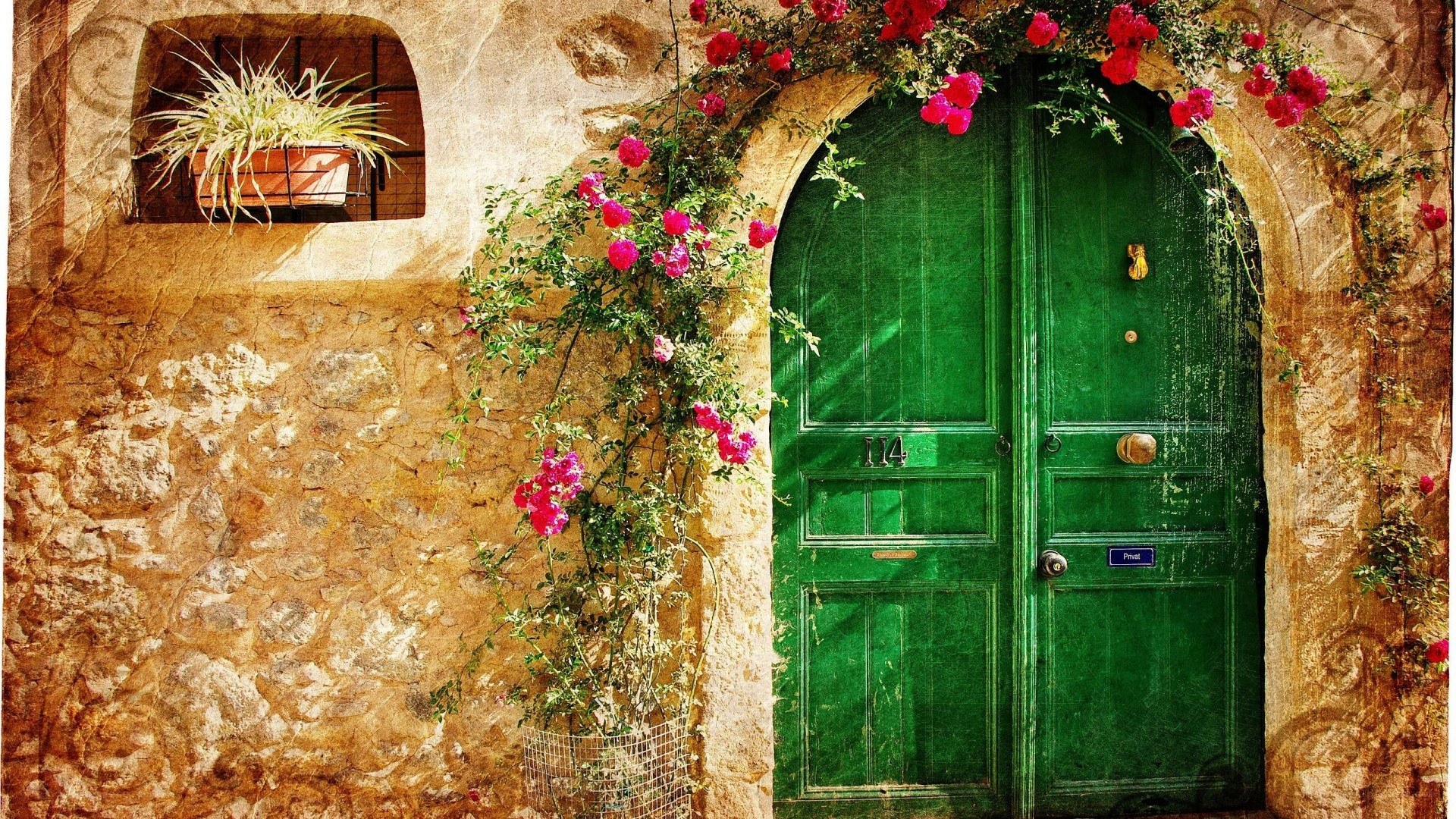 green door with flowers