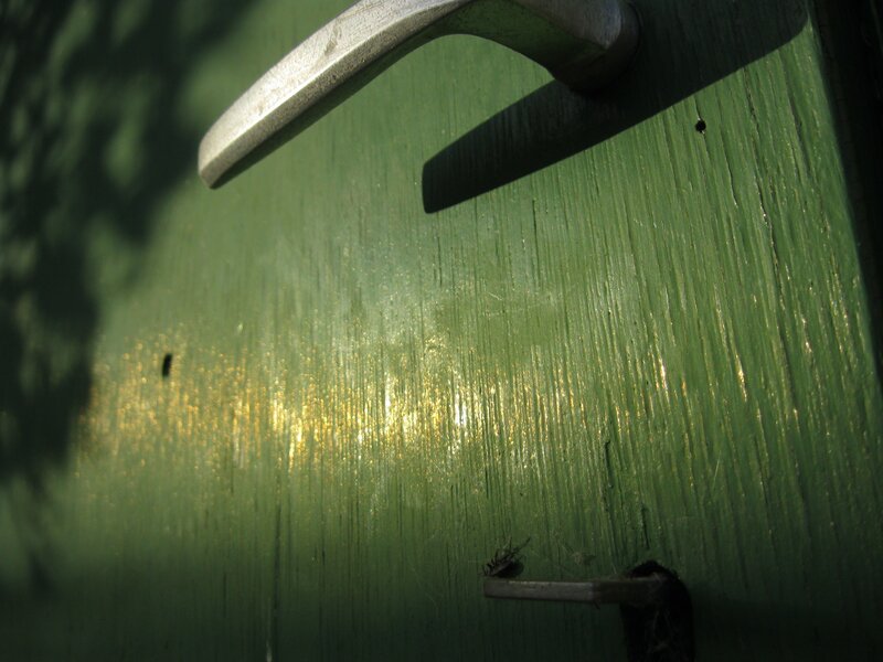 green door with handle
