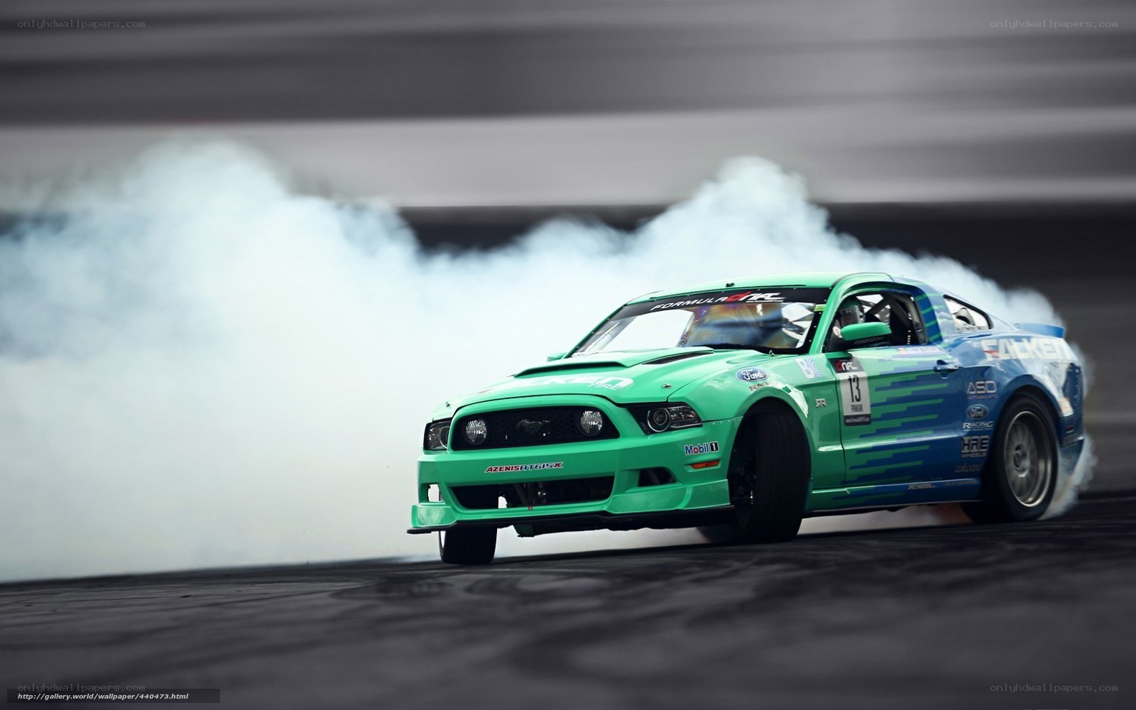 green drift car in action