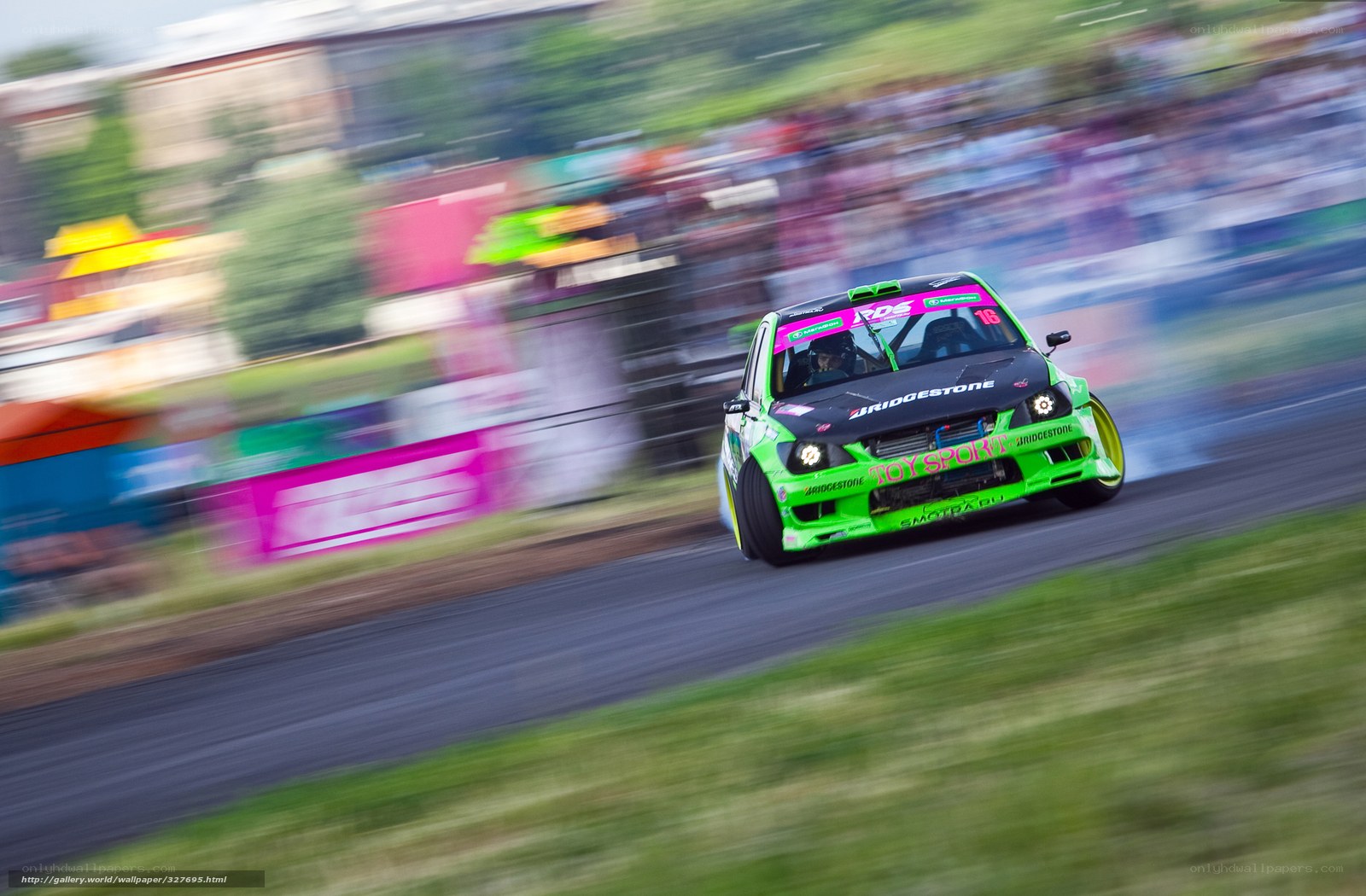 Green drift car in action