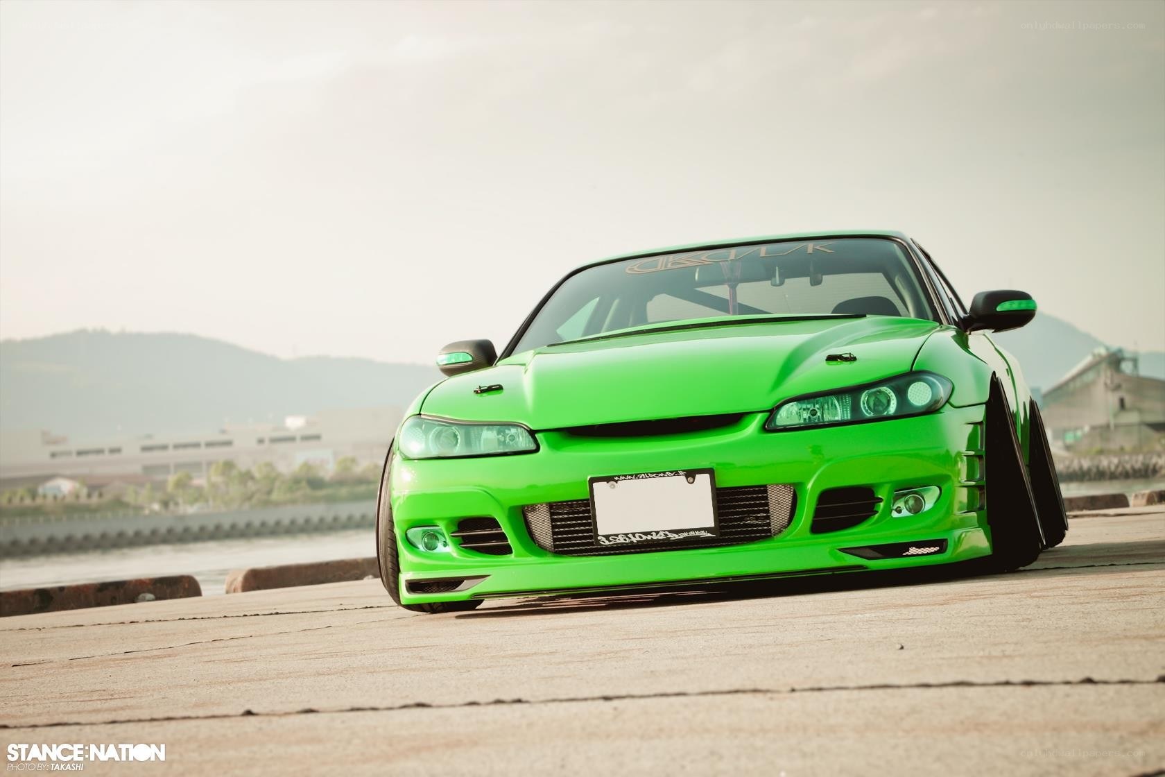 green drift car on pier