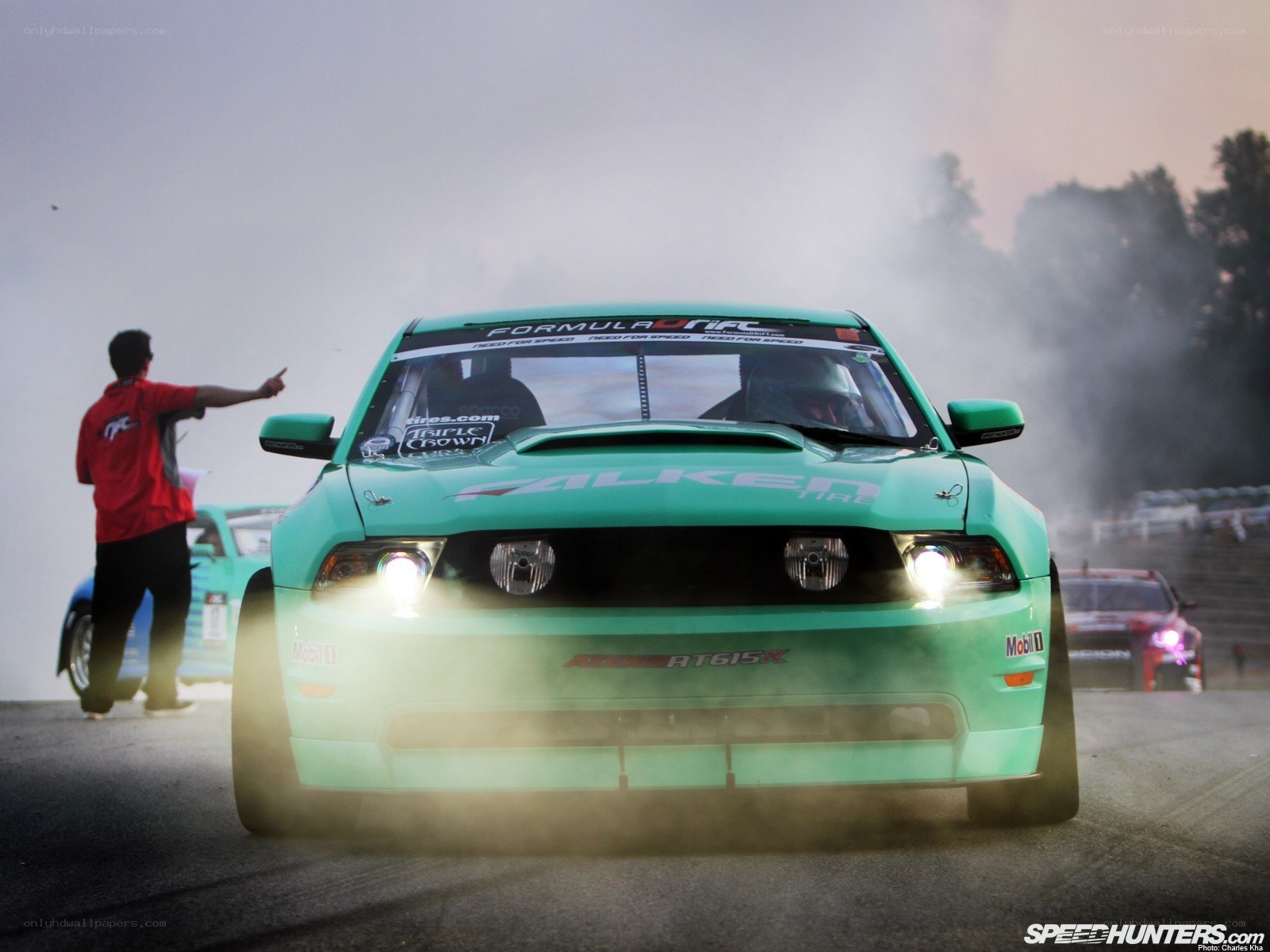 Green drift car on track