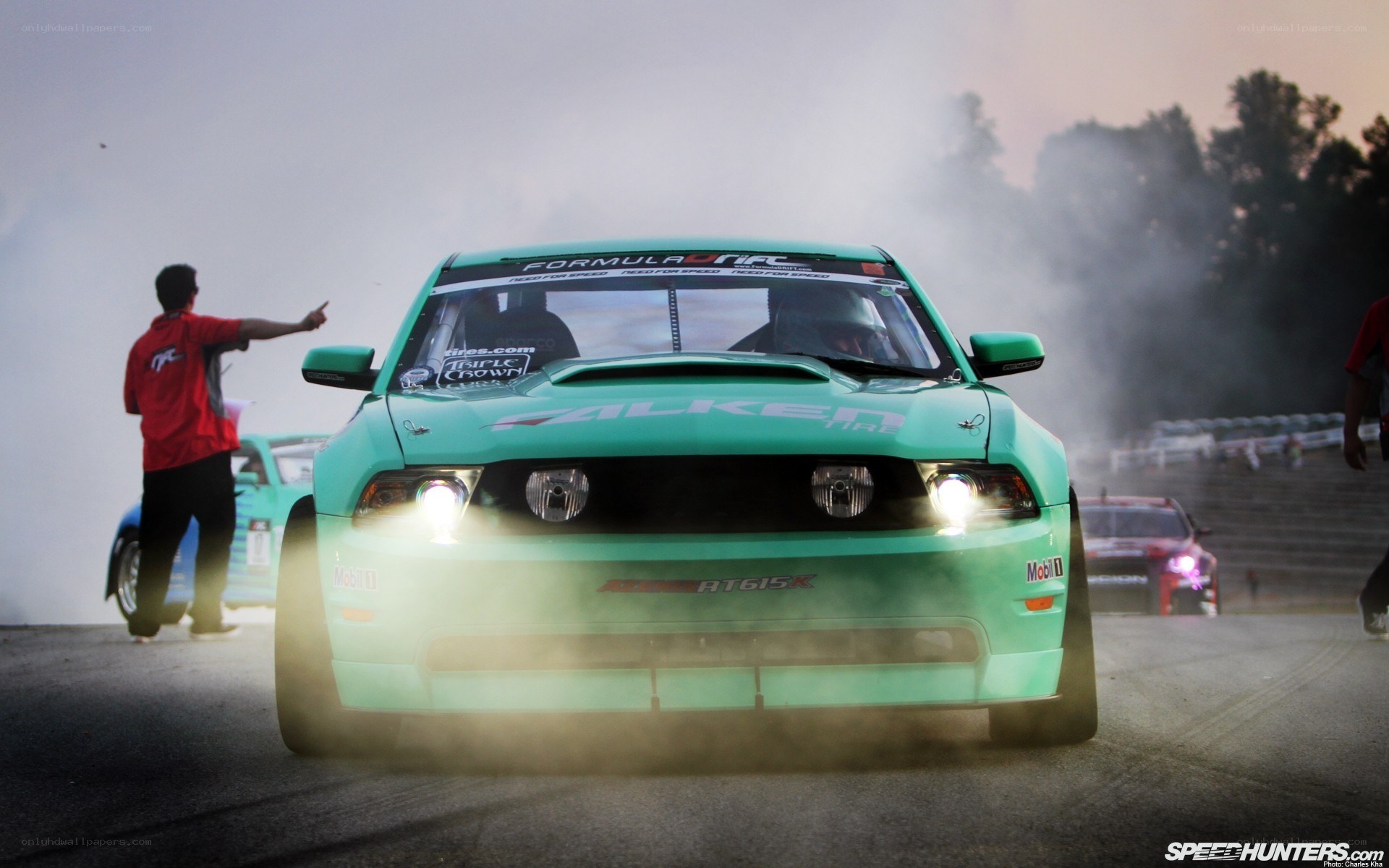Green drift car on track