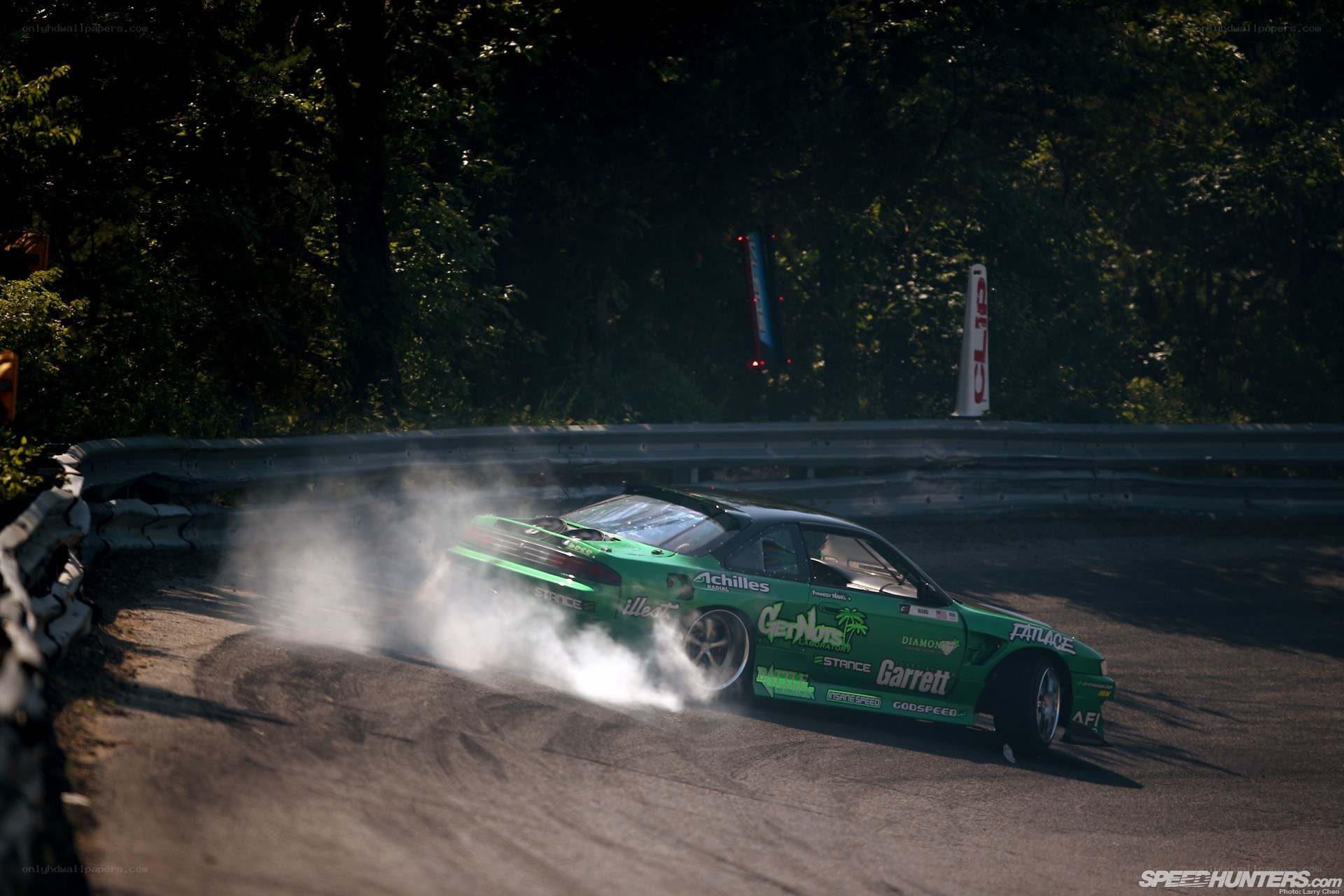 Green drift car on track