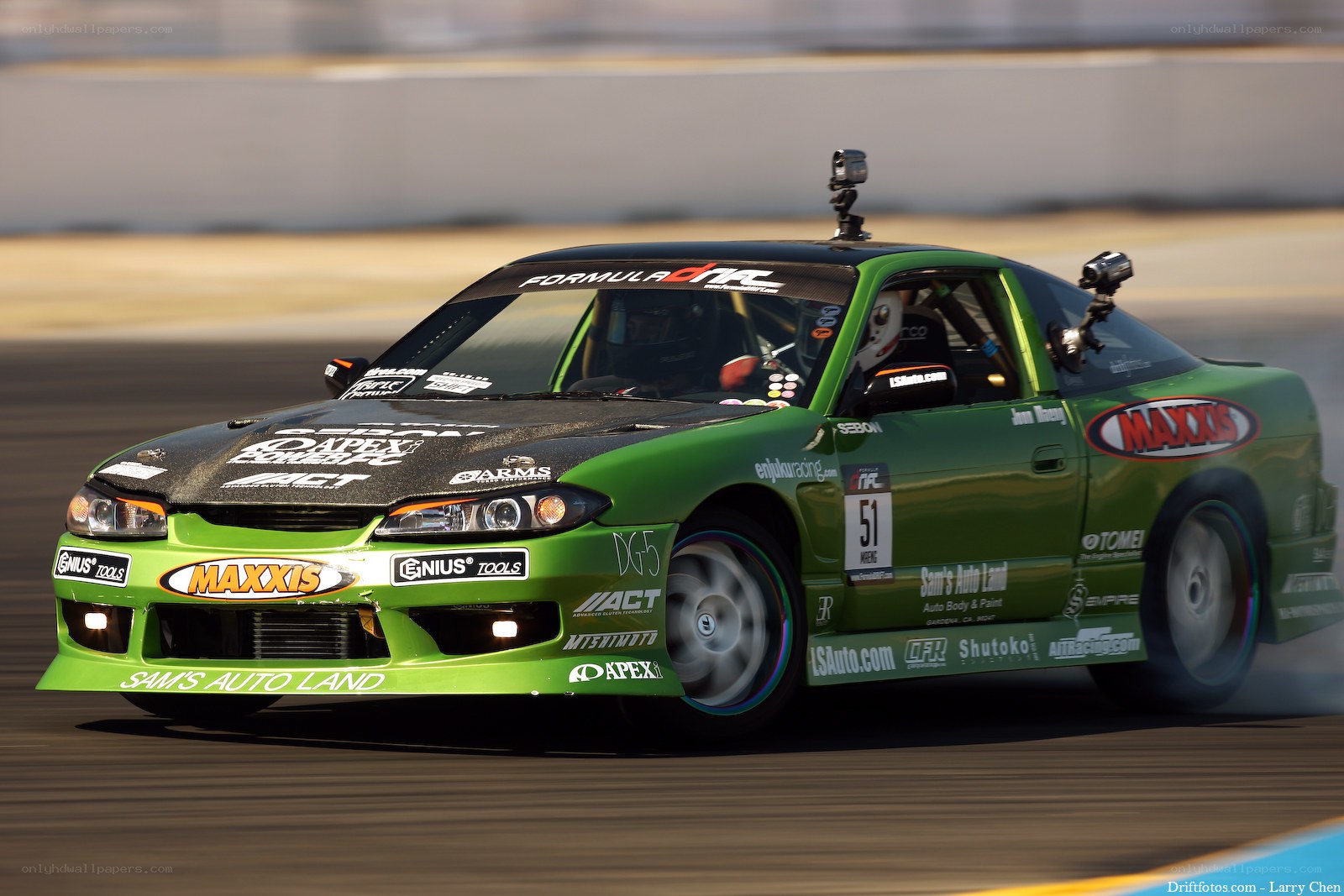 Green drift car on track