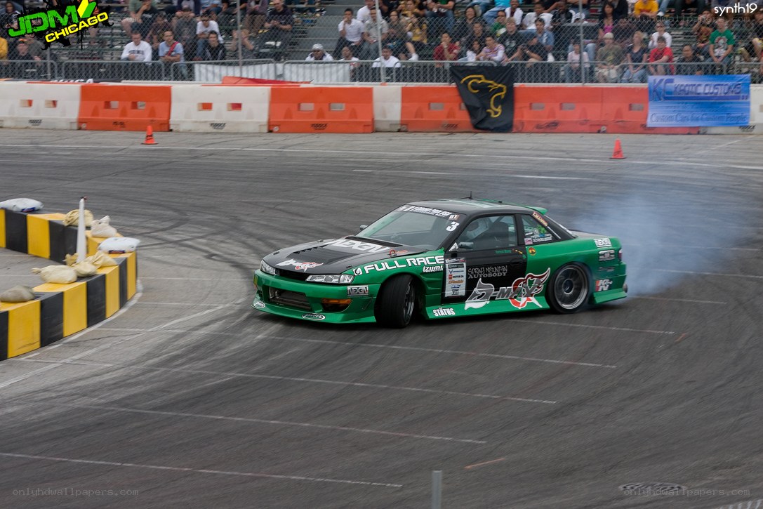 Green drift car on track