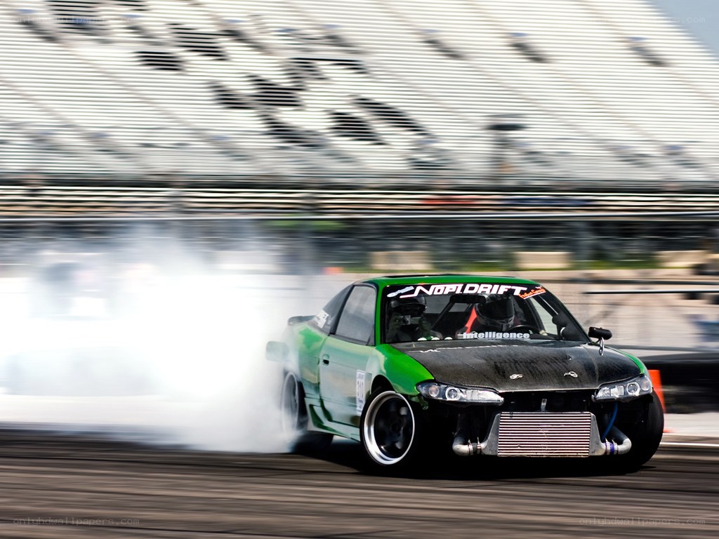 Green drift car on track