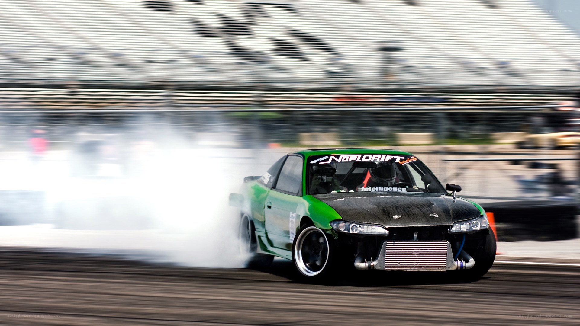 Green drift car on track