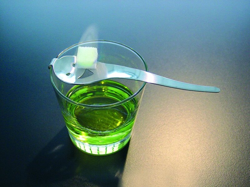green drink with sugar cube