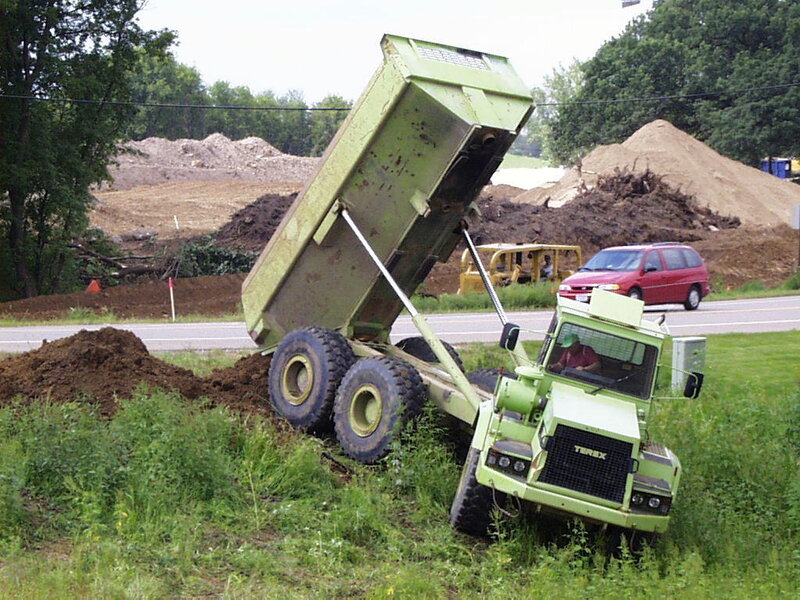 Green Dump Truck Accident
