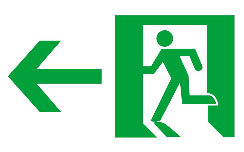 green exit sign with arrow