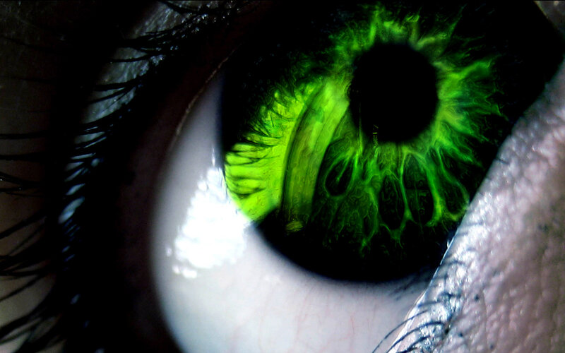 Green Eye Close-up — Dramatic