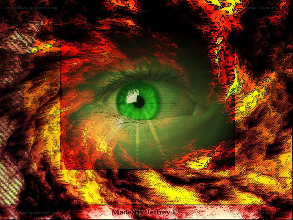 green eye in fiery background