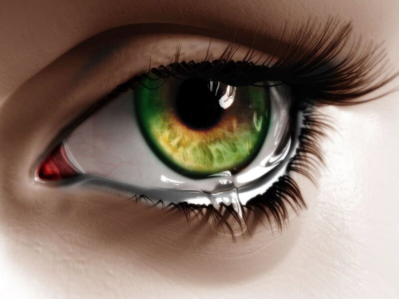 green eye with tear