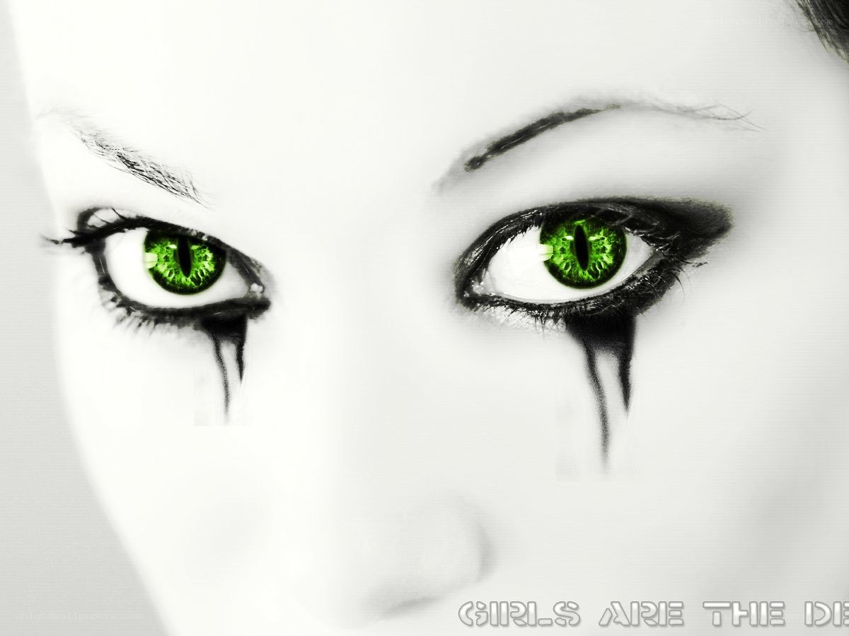 green eyes with black tears