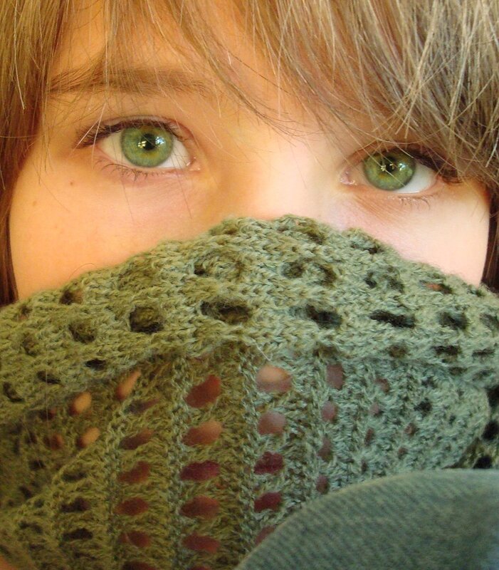 green eyes with knitted scarf