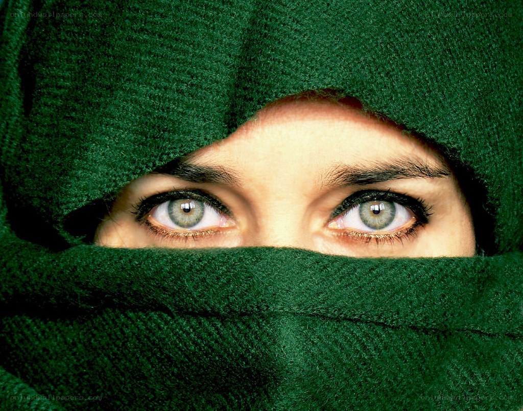 green fabric covering face