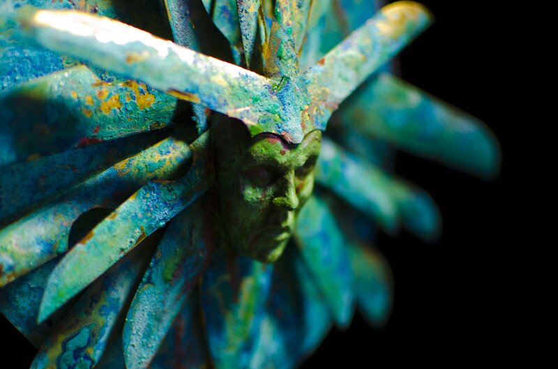 Green Face Sculpture — Blue