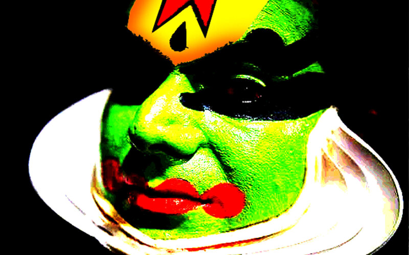 Green-faced Performer