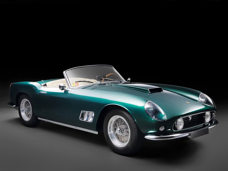 Green Ferrari convertible sports car