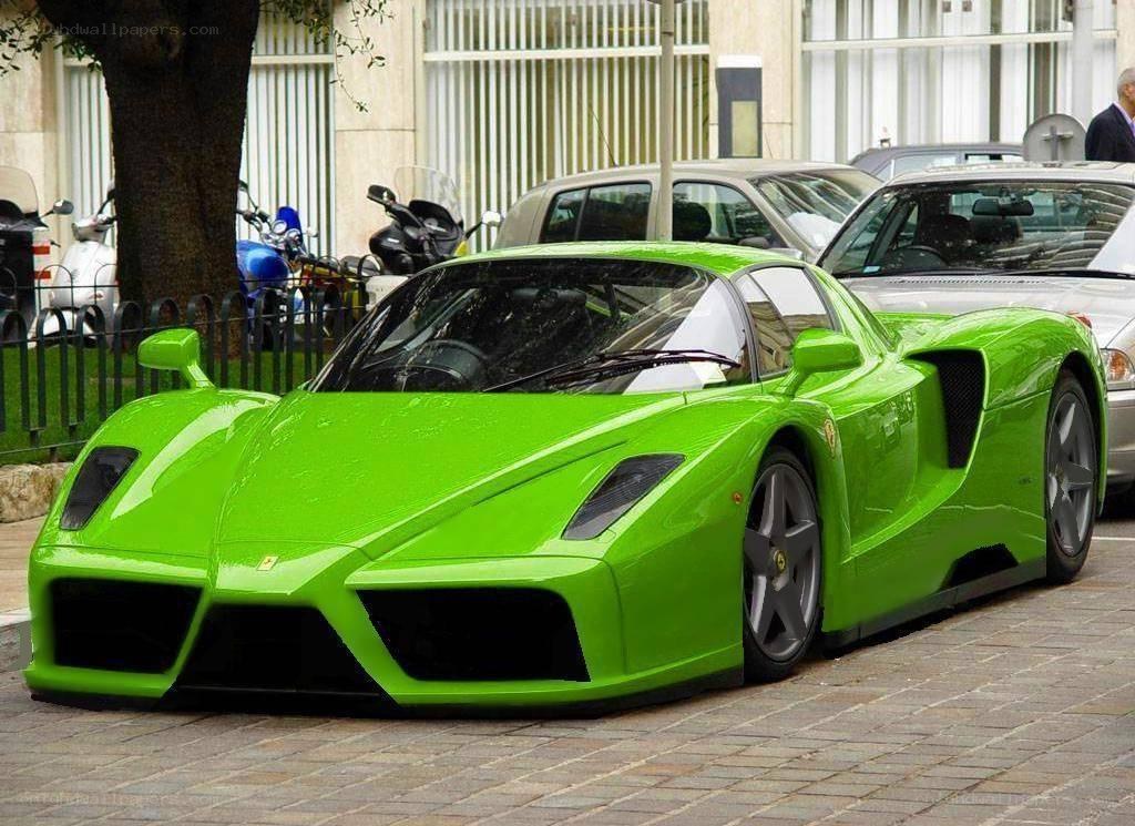 green ferrari enzo parked