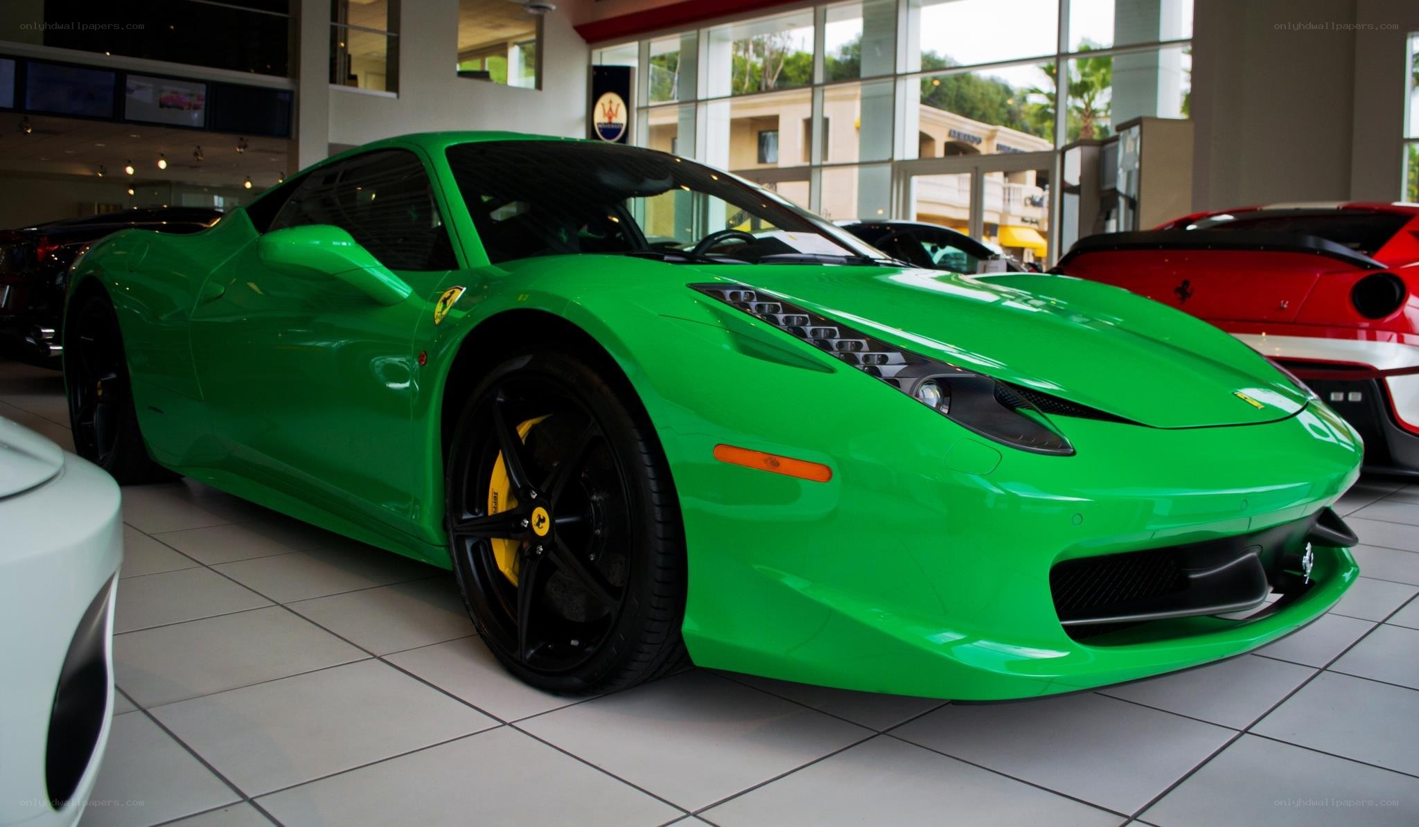 Green Ferrari in showroom