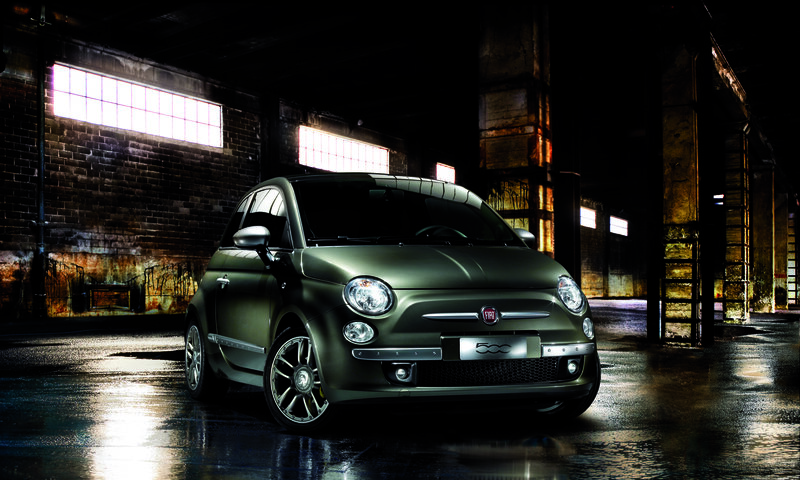 Green Fiat 500 in warehouse