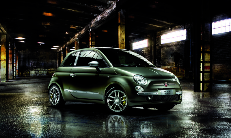 Green Fiat 500 in warehouse