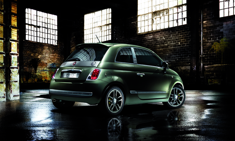 Green Fiat 500 in warehouse
