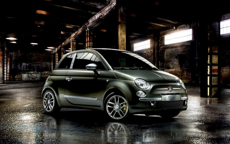 Green Fiat 500 in warehouse