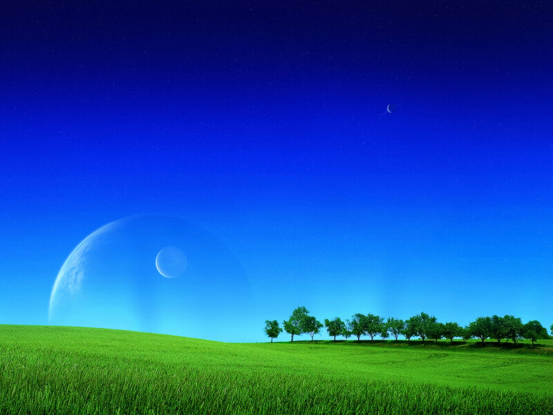 Green field under alien sky