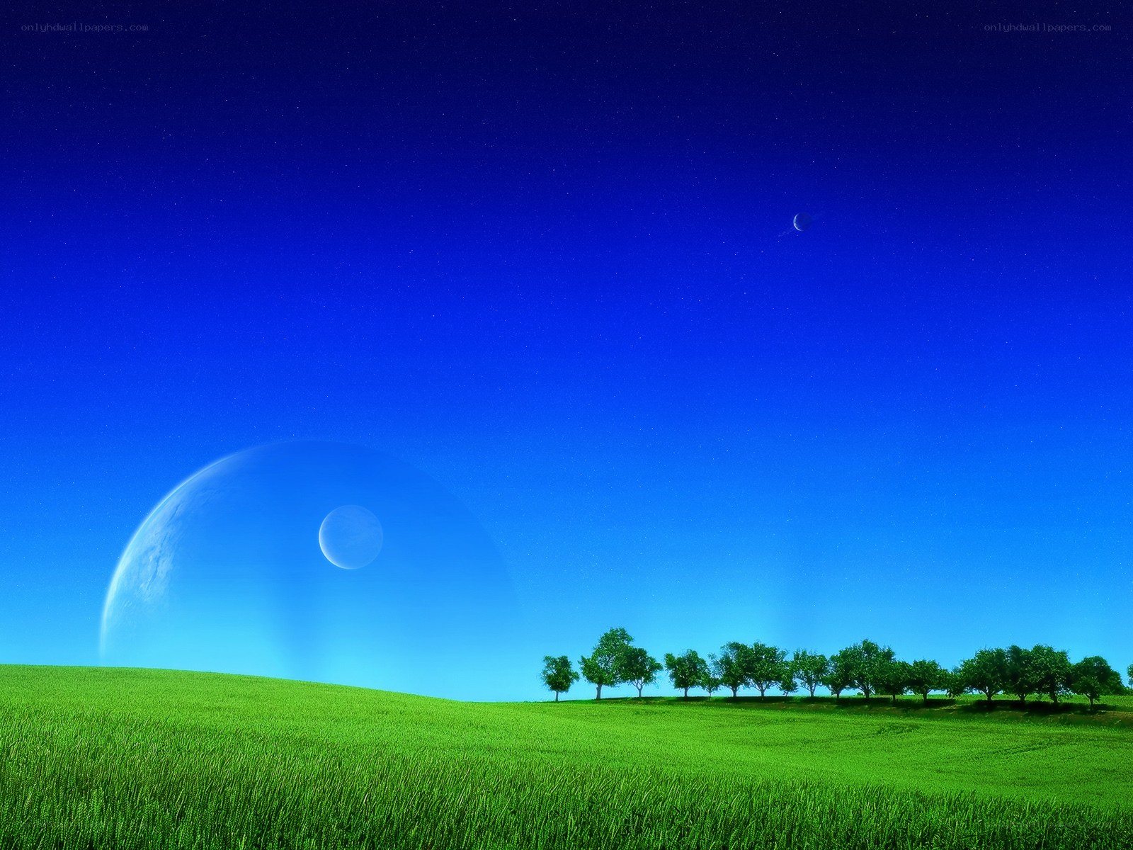 Green field under alien sky