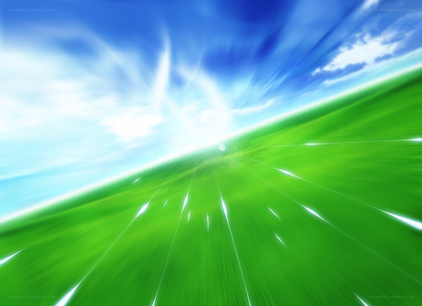 green field under blue sky