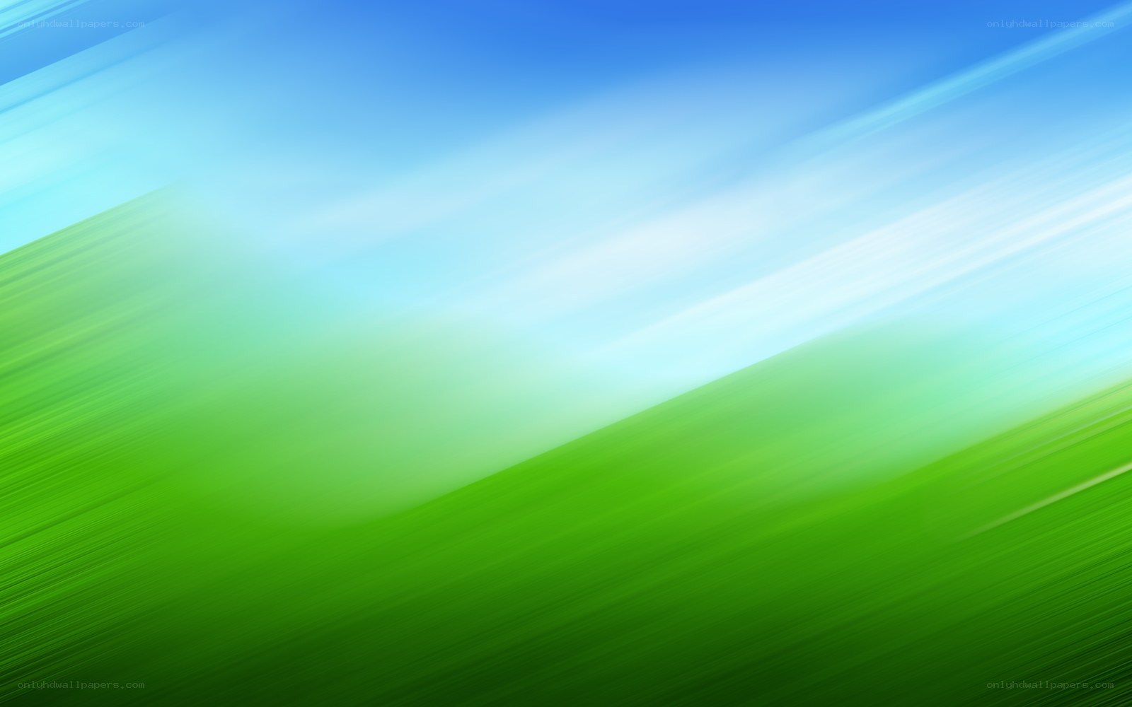 green field under blue sky