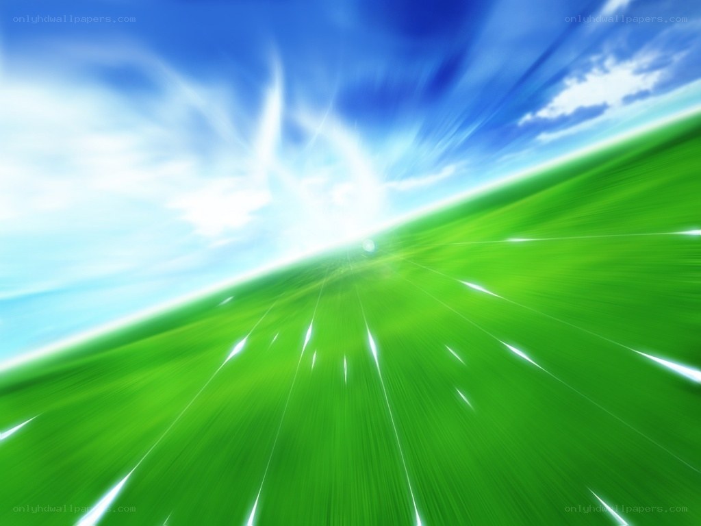 green field under blue sky