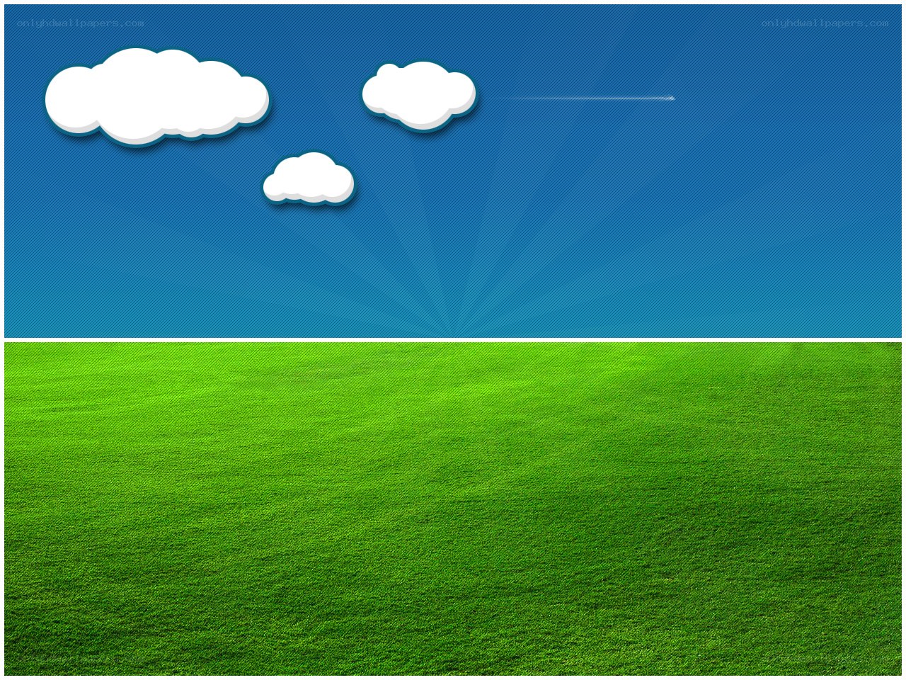 green field under blue sky