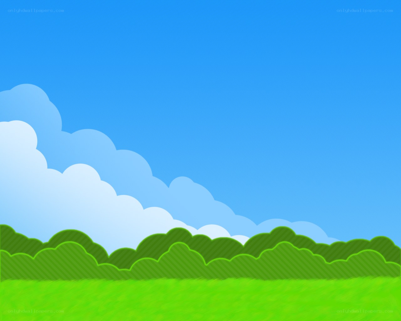 green field under blue sky