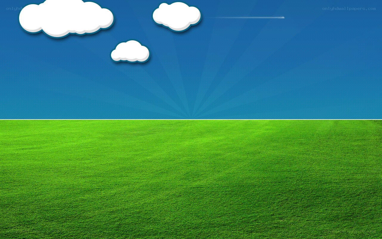 green field under blue sky