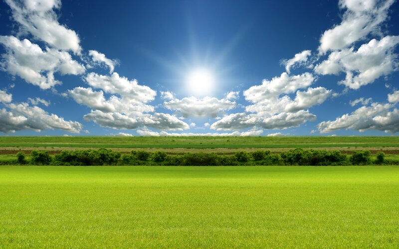 Green Field under Blue Sky — Serene, Afternoon, Photograph, Sun, Clouds, Hills