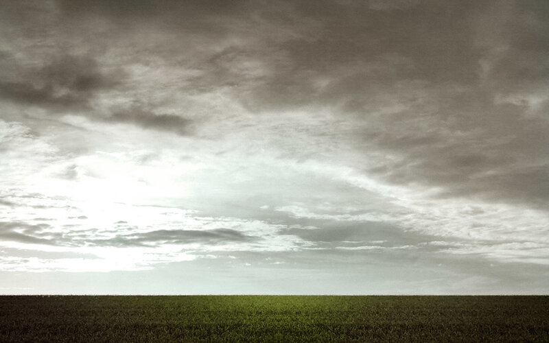 Green Field under Cloudy Sky — Dramatic, Photograph, Clouds