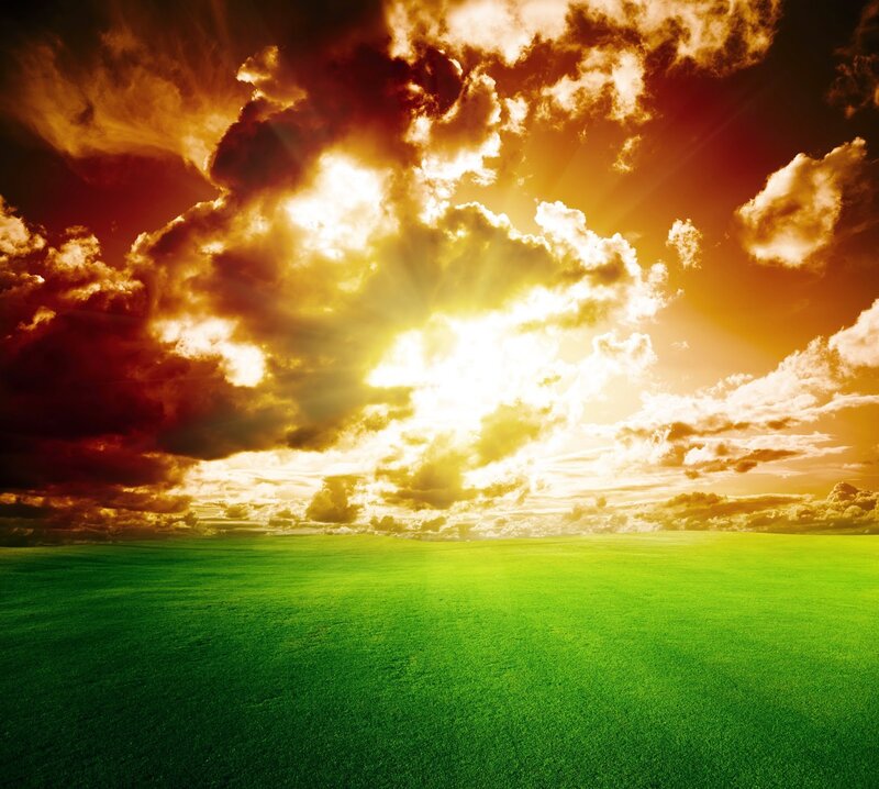 Green Field under Cloudy Sky — Dramatic, Sunset, Photograph, Clouds, Sun
