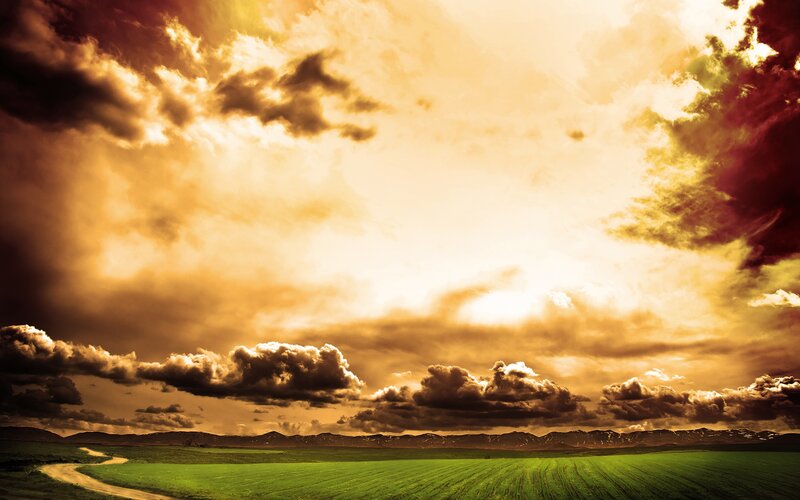 Green Field under Cloudy Sky — Dramatic, Sunset, Photograph, Road