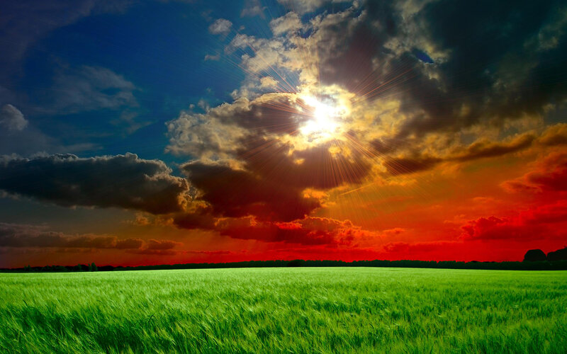 Green Field under Cloudy Sky — Dramatic, Sunset, Photograph, Sun