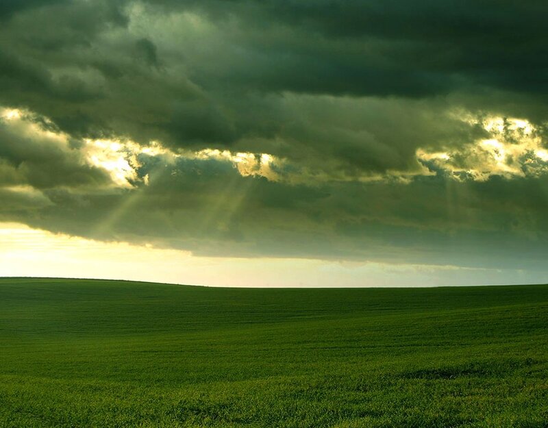 Green Field under Stormy Sky — Dramatic, Sunset, Photograph, Clouds