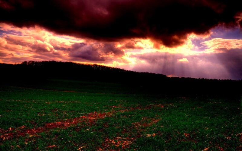 Green Field under Stormy Sky — Dramatic, Sunset