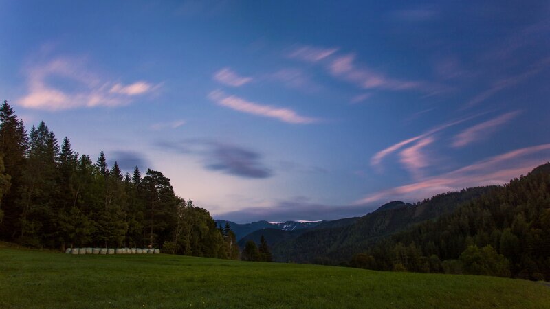 Green Field with Hay Bales — Blue