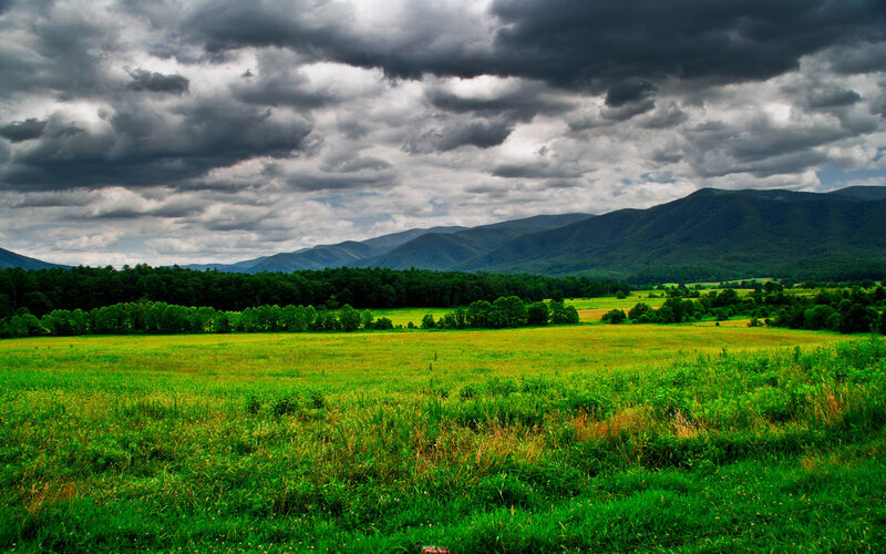 Green Field with Mountains — Dramatic, Afternoon, Photograph, Clouds, Trees