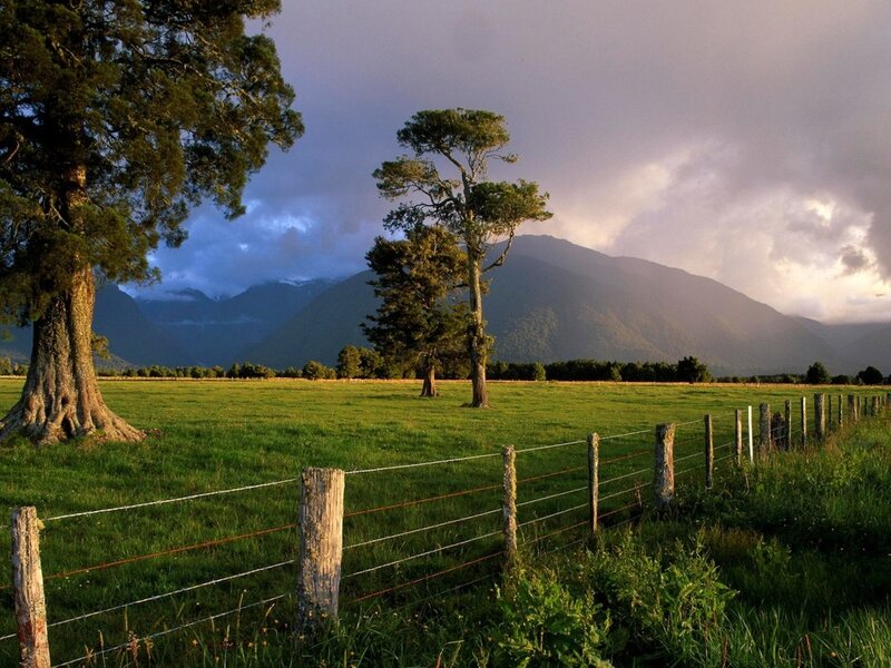 Green Field with Mountains — Dramatic, Sunset