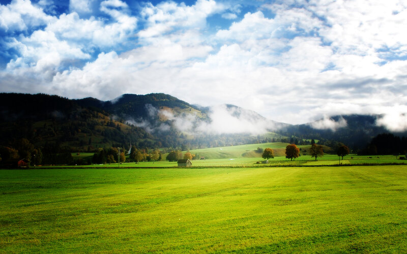 Green Field with Mountains — Serene, Morning